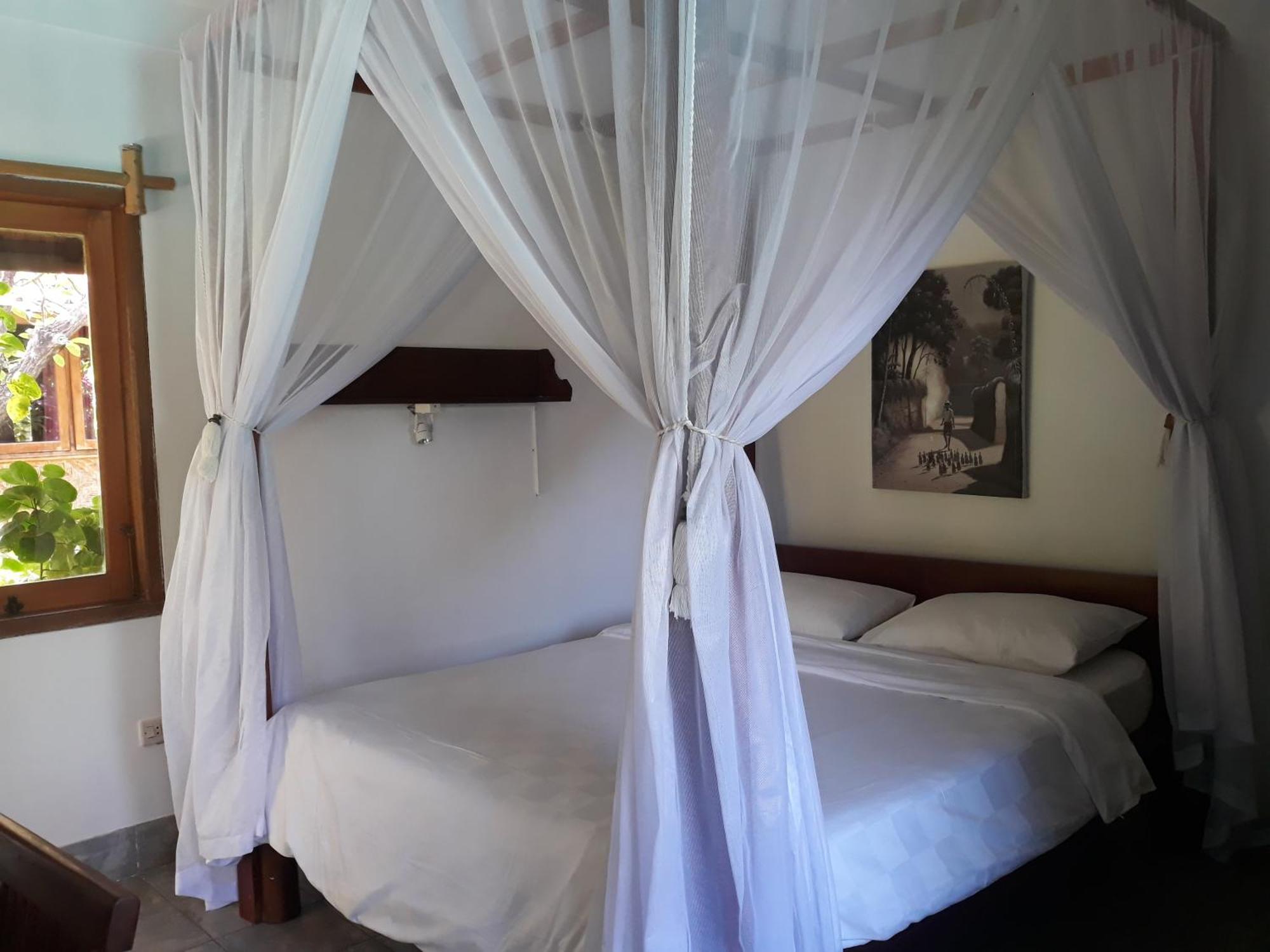 Le Jardin Hotel Amed Værelse billede